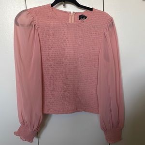Pink smocked shirt